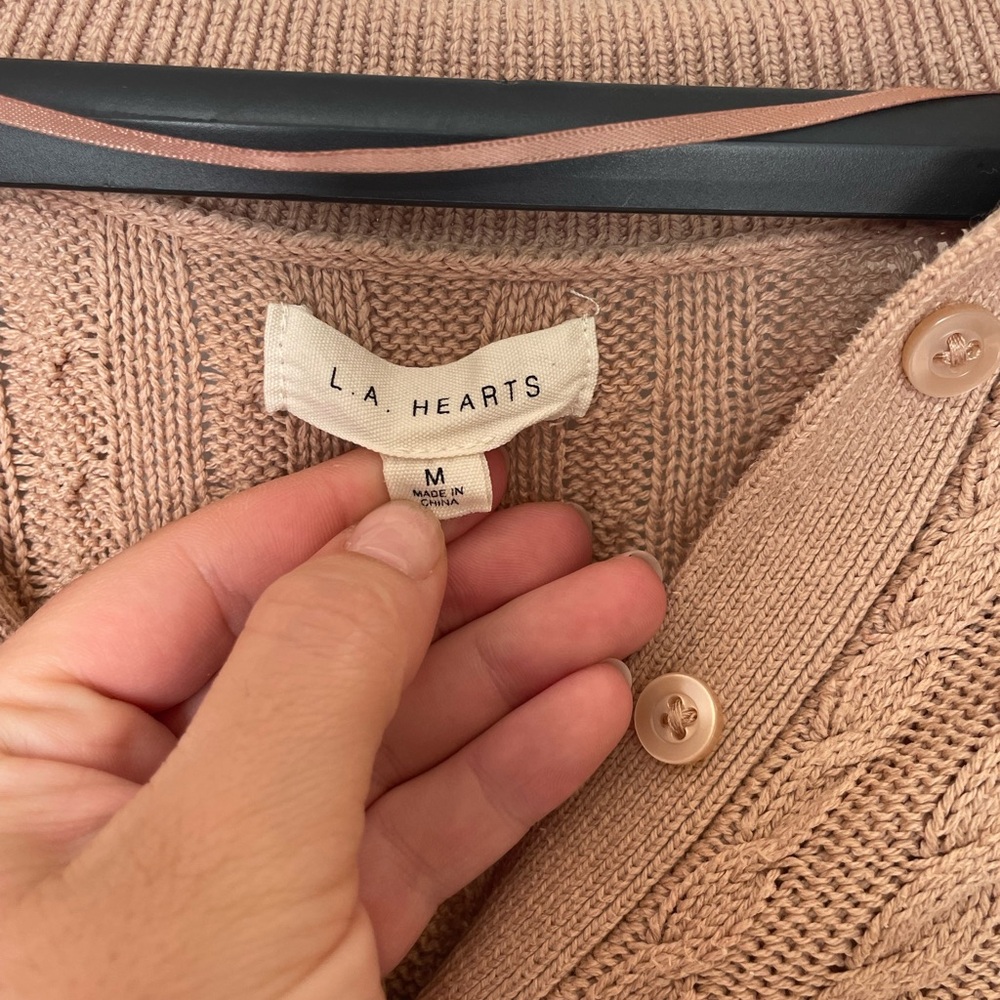 LA Hearts fisherman style button up collared sweater.